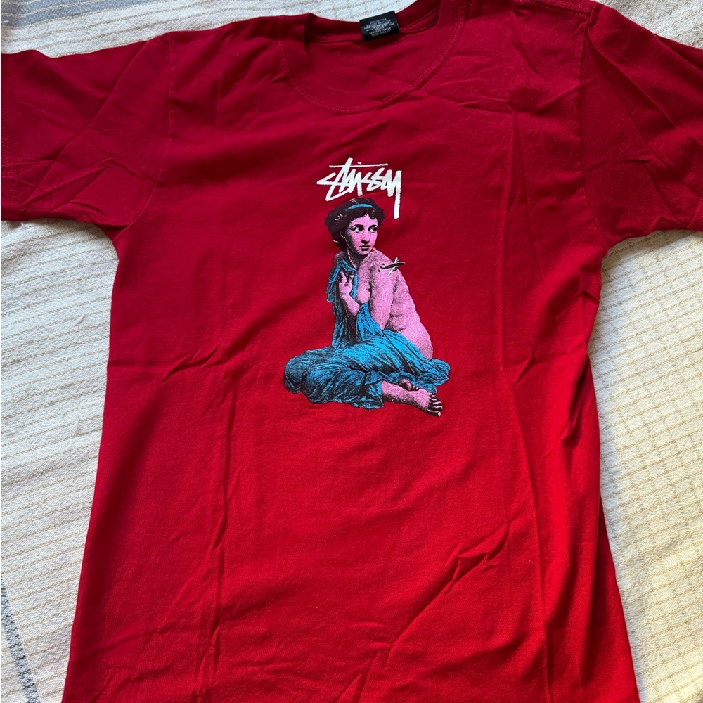 Stussy Red Tee with Artistic Graphic